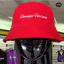 Foreign Fortune Bucket Hats
